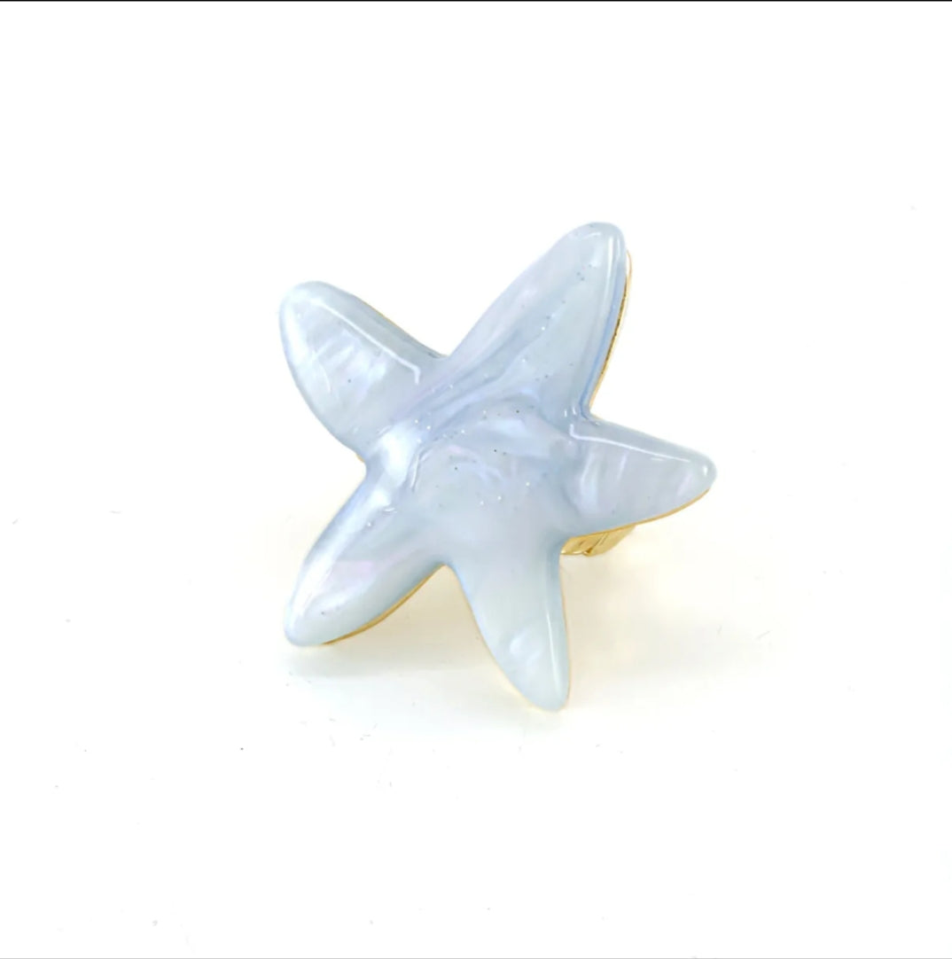 Anillo estrella de mar azul marmoleado elástico.