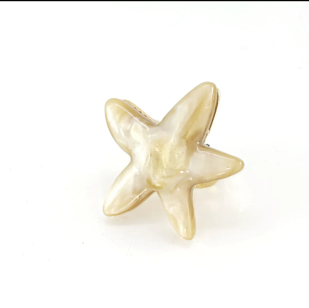Anillo estrella de mar beige marmoleado efecto piedra.