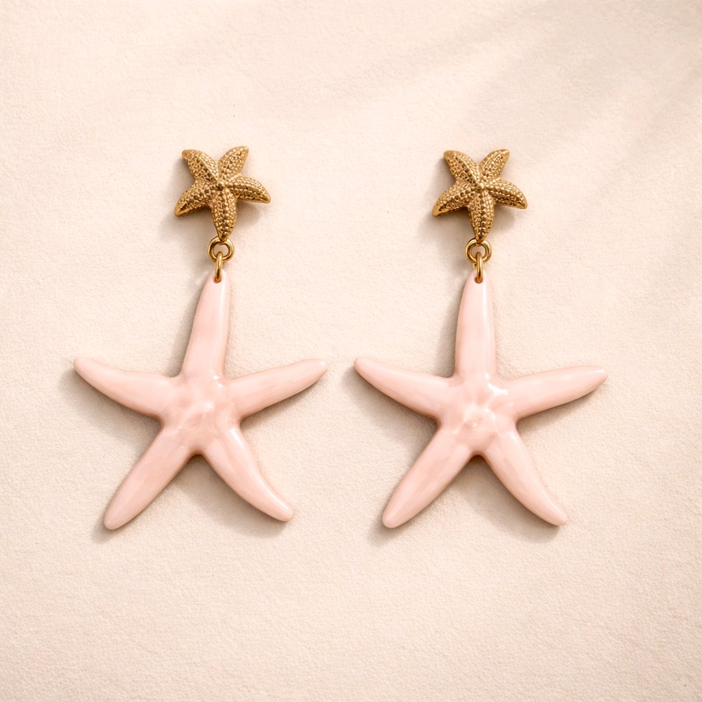 Pendientes colgantes con forma de estrella de mar en color rosa empolvado y metal dorado, diseño ligero y sin níquel de Muzetto