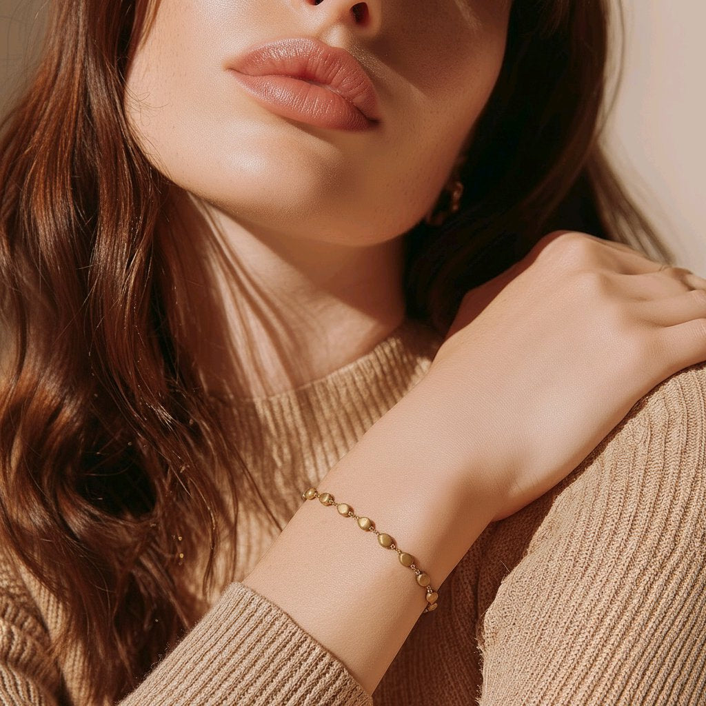 PULSERA ``SELENE`` CADENA DE GOTAS DORADAS (ACERO INOXIDABLE)