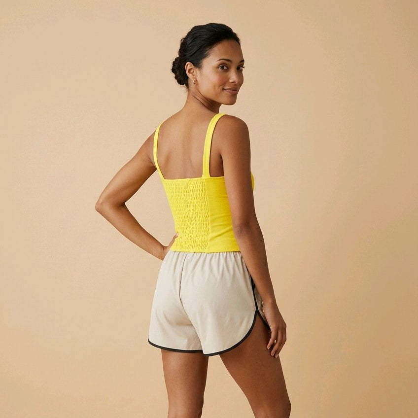 Top corsé amarillo de algodón para primavera con diseño entallado y encaje Livia de Muzetto 
