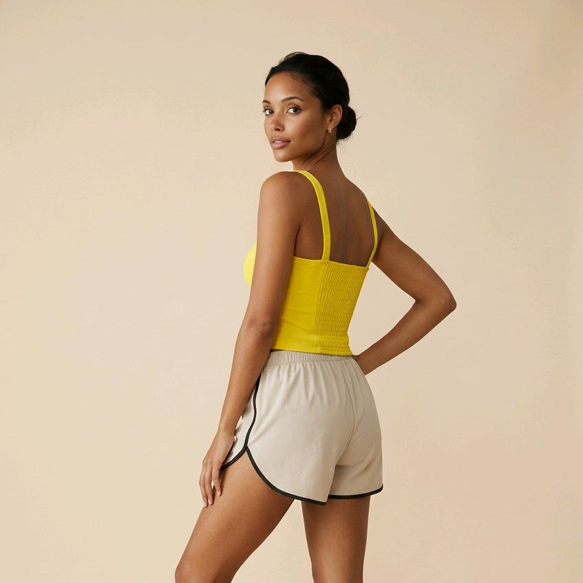 Top corsé amarillo de algodón para primavera con diseño entallado y encaje Livia de Muzetto 
