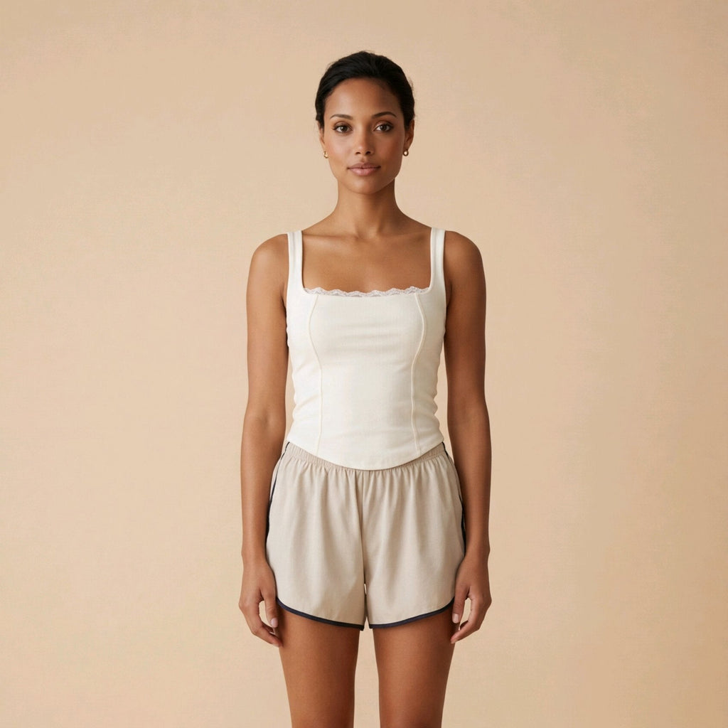 Top corsé blanco de algodón para primavera con diseño entallado y encaje Livia de Muzetto 
