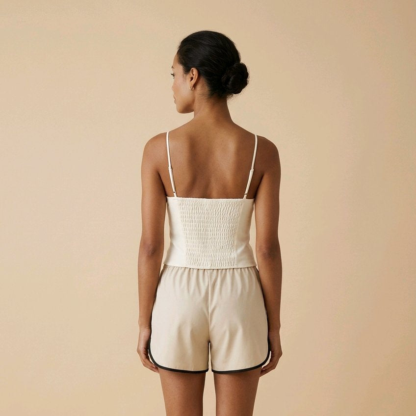 Top corsé blanco de algodón para primavera con diseño entallado y encaje Livia de Muzetto 
