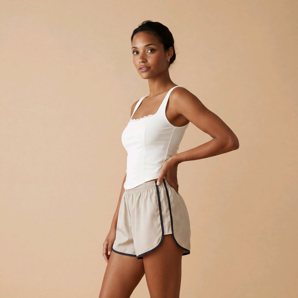 Top corsé blanco de algodón para primavera con diseño entallado y encaje Livia de Muzetto 
