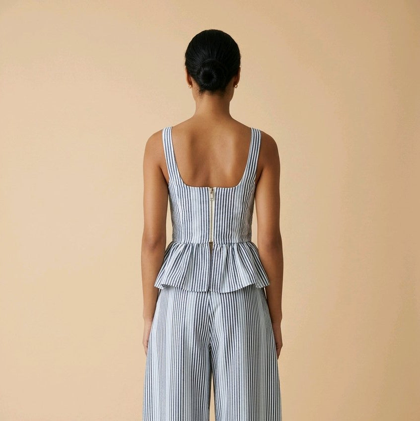 Top peplum de rayas verticales azules y blancas con escote cuadrado y cremallera trasera metálica completa modelo Portofino de Muzetto
